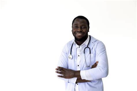 African American Male Doctor Smiling With Full Uniform And Stethoscope