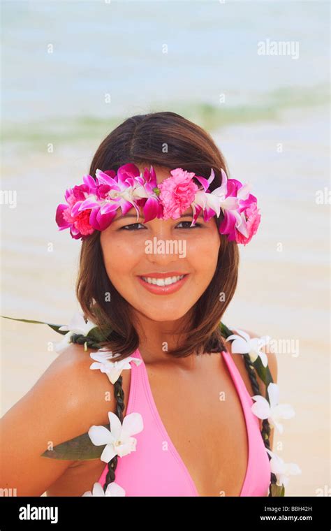 Portrait Of A Hawaiian Girl With Flower Lei At A Beach In Hawaii Stock