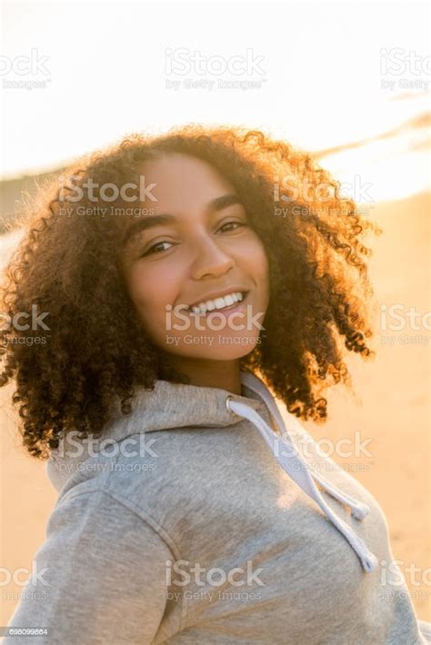 Outdoor Portrait Of Beautiful Happy Mixed Race African American Girl