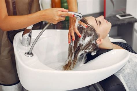 Free Photo Woman Washing Head In A Hairsalon Washing Hair Hair