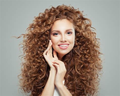 Young Happy Redhead Woman With Long Healthy Curly Hair Hair Care