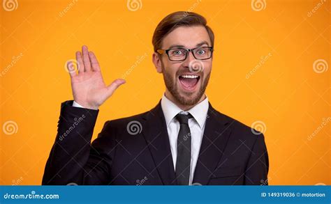 Friendly Man In Suit Waving Hand Saying Hello Inviting For Work