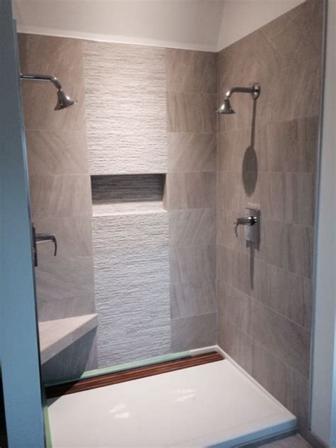 You can even create different tile patterns to add a little more personality to the space. Contemporary shower. 12x24 tile with 12x24 muretto accent ...