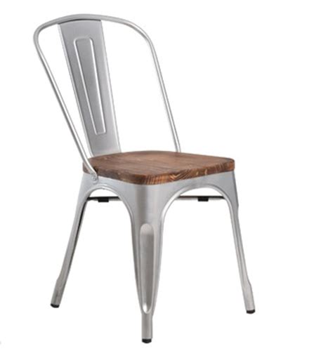 Look for furniture with galvanized finishes or trestle bases that exude a mixed media effect. Industrial Farmhouse Style Chairs {on a budget}
