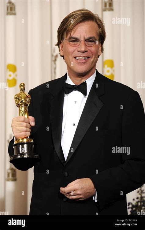Best Adapted Screenplay Winner Aaron Sorkin For The Social Network Poses With His Oscar At The