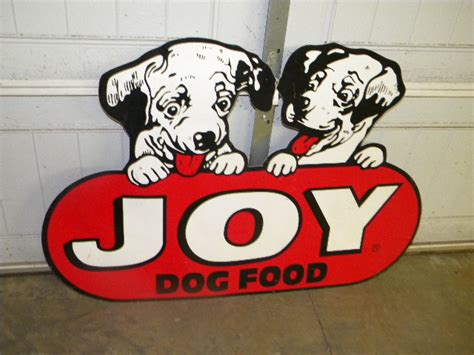 Together, these figures suggest a carbohydrate. Photo :: $OLD Original Joy Dog Food Diecut Sign