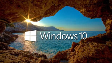 Windows 10 Over The Cave White Text Logo Wallpaper