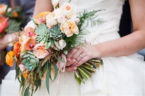 A large colorful watercolor flowers bouquet hand draw. Orange Orchid, Green Succulent Bridal Bouquet