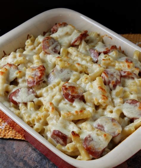 Drain, reserving 1/2 cup pasta cooking water. Smoked Sausage Alfredo Pasta Bake - myfindsonline.com