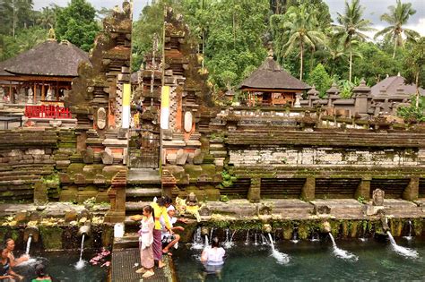 The Tirta Empul Temple Purification Ritual At The Holy Water Temple Bali Trip Destination