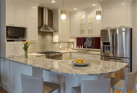 The center kitchen island has a veggie sink on it river white granite for contemporary kitchen designed by brown cabinets. Viscount White - Kitchen Cabinets