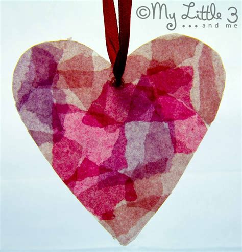 This stained glass effect transforms the appearance of oil pastel or crayon on plain paper with a reveal stage that young children may just find a little bit magical. Stained Glass Milk Jug Hearts | AllFreeKidsCrafts.com