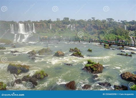 Tourists On Platform In Waters Of Iguacu River At Iguacu Falls Brazil