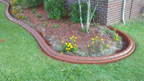 Creating a perfectly contoured lawn means reigning in the straggly edges of your grass. #concrete #curb landscape appeal | Concrete Curbing | Pinterest