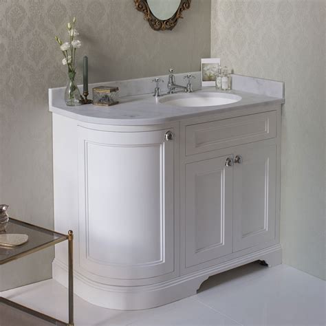 Underneath, you'll find plenty of space for adding your toiletries or towels, so it doubles up as additional storage for your bathroom. Burlington 100 3-Door Corner Vanity Unit & Minerva Worktop ...