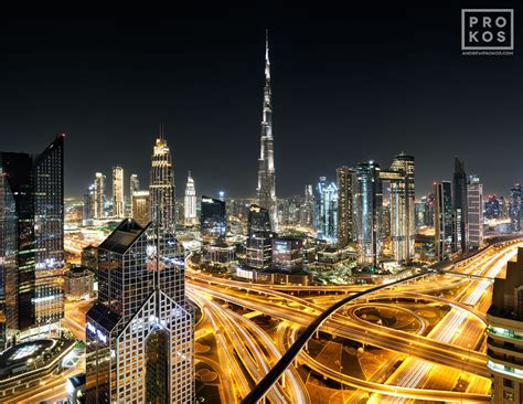View Of Burj Khalifa And Dubai Skyline At Night Framed Photo By