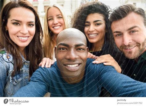 Multiracial Group Of Friends Taking Selfie In A Urban Street A