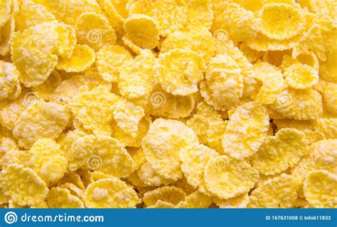 Pour into hot or cold water in bowl your cereal, add milk and sugar, stir with spoon and enjoy its sweet rich taste. Corn-flakes Background And Texture, Cornflake Cereal Box For Morning Breakfast Stock Photo ...