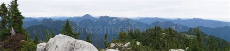 Scenic Panorama Over The Mountains Of North Vancouver In Summer Snow