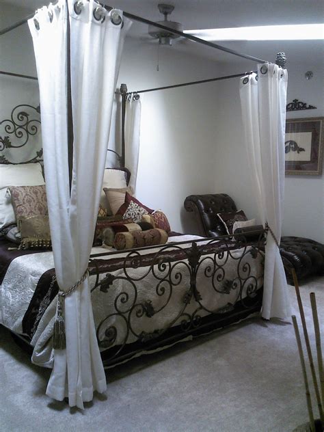 Wrought Iron Four Post Canopy King Bed In Master Master Bedroom