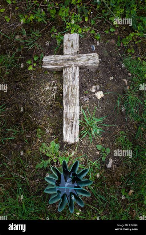 Old Wooden Cross Laid On Ground Marking Grave Stock Photo Alamy