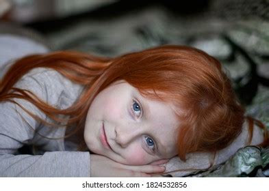 Redhead Girl Lying On Bed Stock Photo Shutterstock