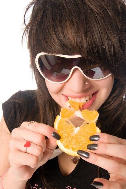 Free Photo Girl Eating Orange