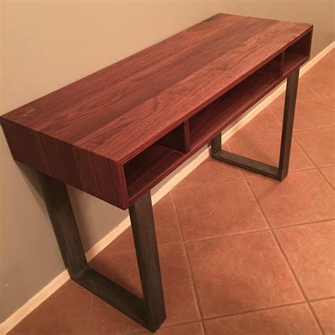 The height of the desk can be adjusted by switching out different sections of pipe. DIY Walnut desk with steel legs. : woodworking