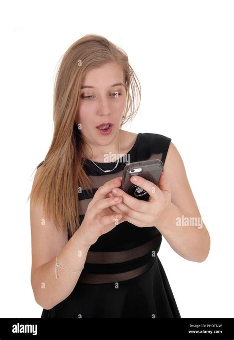 Woman Shocked What Is On Her Phone Stock Photo Alamy