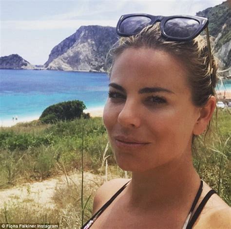 Fiona Falkiner Draws Attention To Her Bronzed Cleavage And