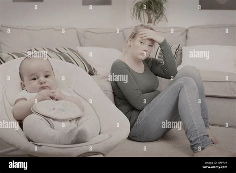 Young New Mother Suffering From Postpartum Depression Stock Photo Alamy