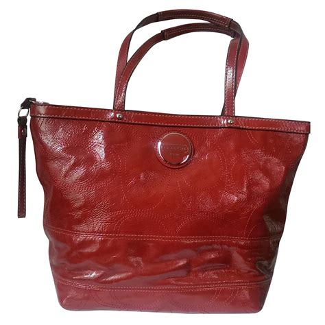 red patent leather coach handbag