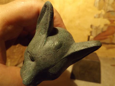 egyptian statue fragment cat goddess bast bastet wearing the eye of horus