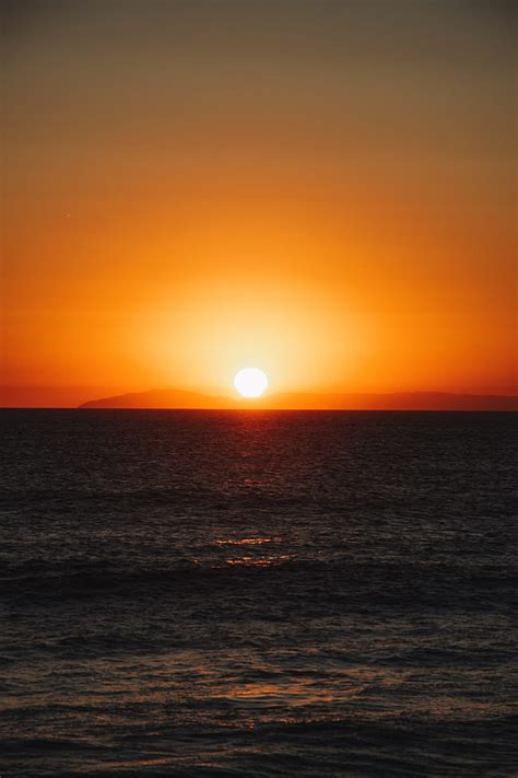 Sun Sunset Sea Horizon Waves Glare Hd Phone Wallpaper Peakpx