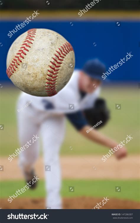 Baseball Pitcher Throwing Focus On Ball Stock Photo 147286307