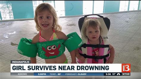 girl rescued from nearly drowning youtube