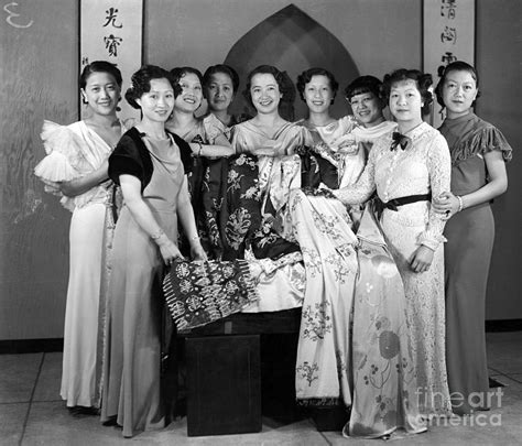 Chinese Girls In Traditional Clothing By Bettmann