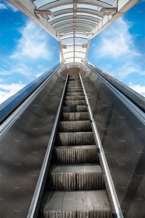 Escalators to heaven | Business Images ~ Creative Market