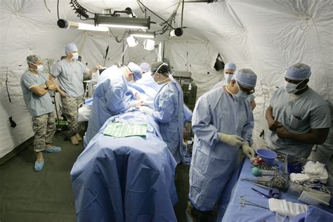 Army Surgeons Operate On Soldiers In Field Environment Article The