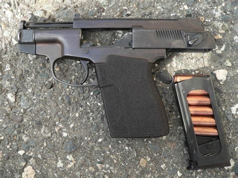 Pss Internally Suppressed Pistol With Action Open And Magazine Of Ready
