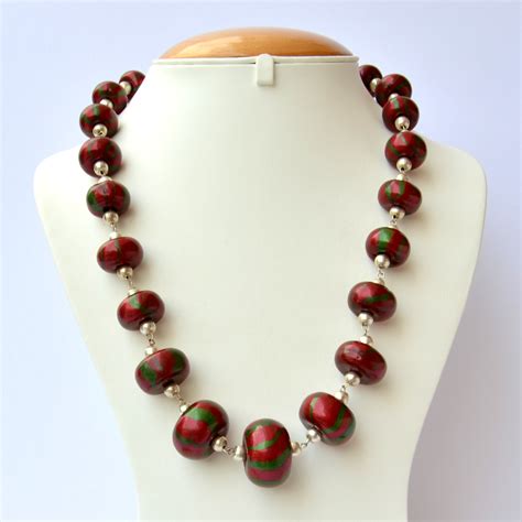 Handmade Necklace With Maroon Beads Having Green Stripes Maruti Beads