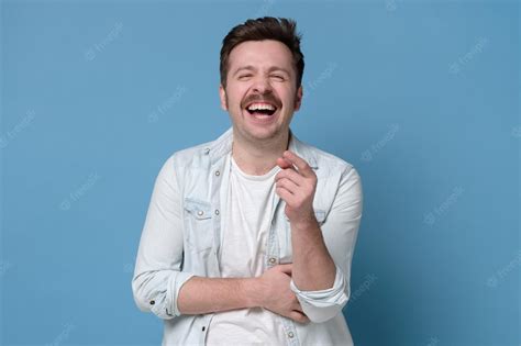 Premium Photo Laughing Caucasian Man With Mustache Funny Reaction On Joke