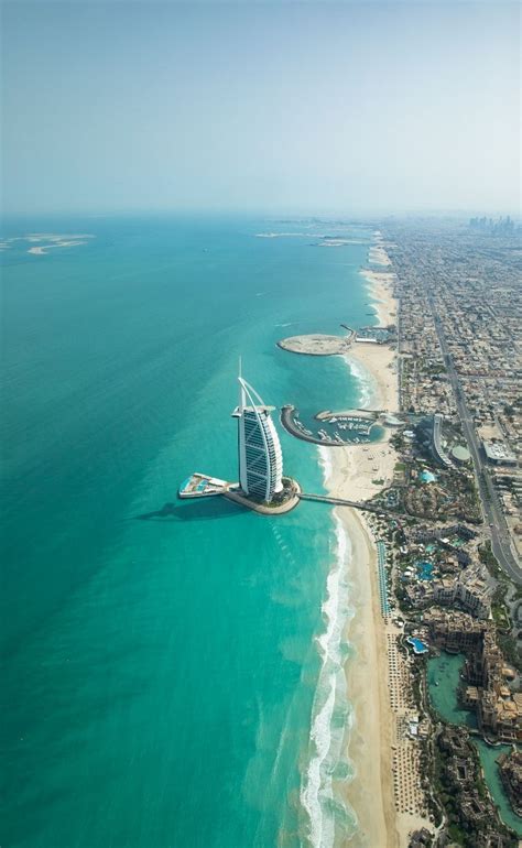 An Aerial View Of The Burj Al Arab Beach Resort In Dubai United