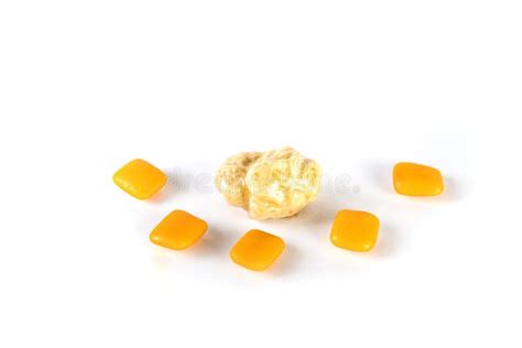 Whole Pieces And Chewed Orange Bubble Gum Isolated Over White Stock