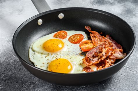 Premium Photo Fried Eggs With Bacon In A Pan Keto Diet Keto
