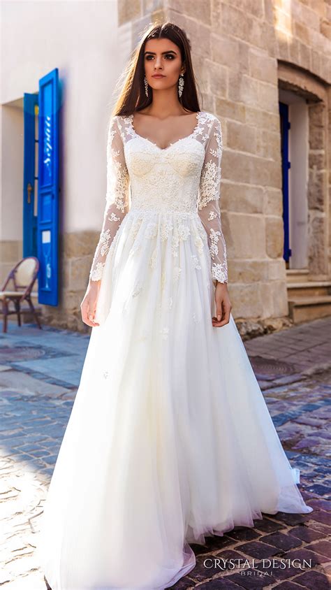 Sweet heart neck line, cami straps, patterned waistband, dip hem and all over printed floral design. Crystal Design 2016 Wedding Dresses | Wedding Inspirasi