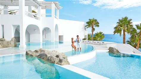 Mykonos Blu Luxury Hotel And Resort In Mykonos Psarou Beach Luxury Tours Greece Honeymoon
