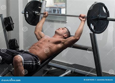Muscular Man Doing Bench Press Exercise For Chest Stock Image Image