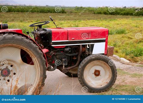 Agriculture Aged Red Tractor Retro Vintage Stock Photo Image Of Grass