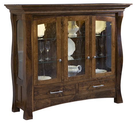These american made gun cabinets are handcrafted by skilled amish craftsmen.you can conceal your firearms safely and still be readily accessible. 63" Reno Curio Cabinet from DutchCrafters Amish Furniture